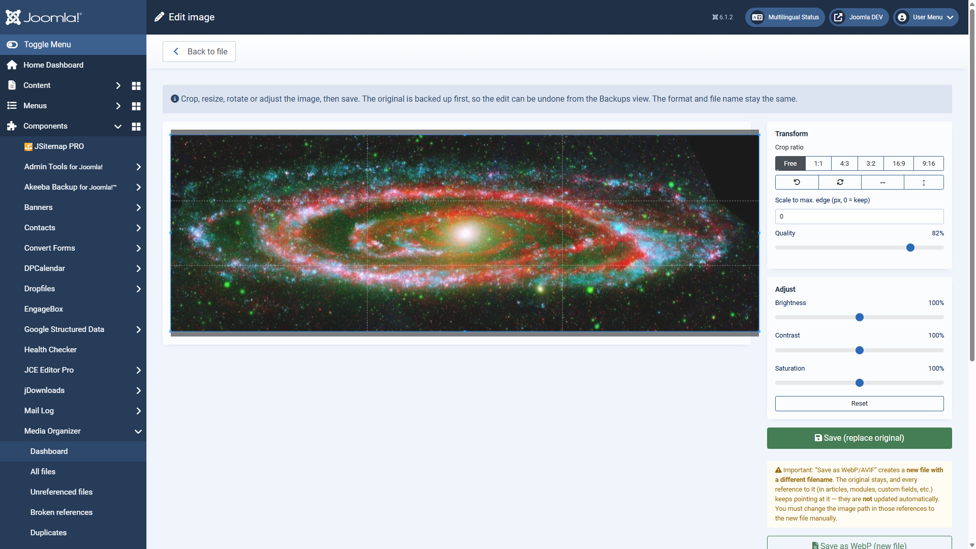The image editor with the crop frame and the sliders for transformation and adjustment